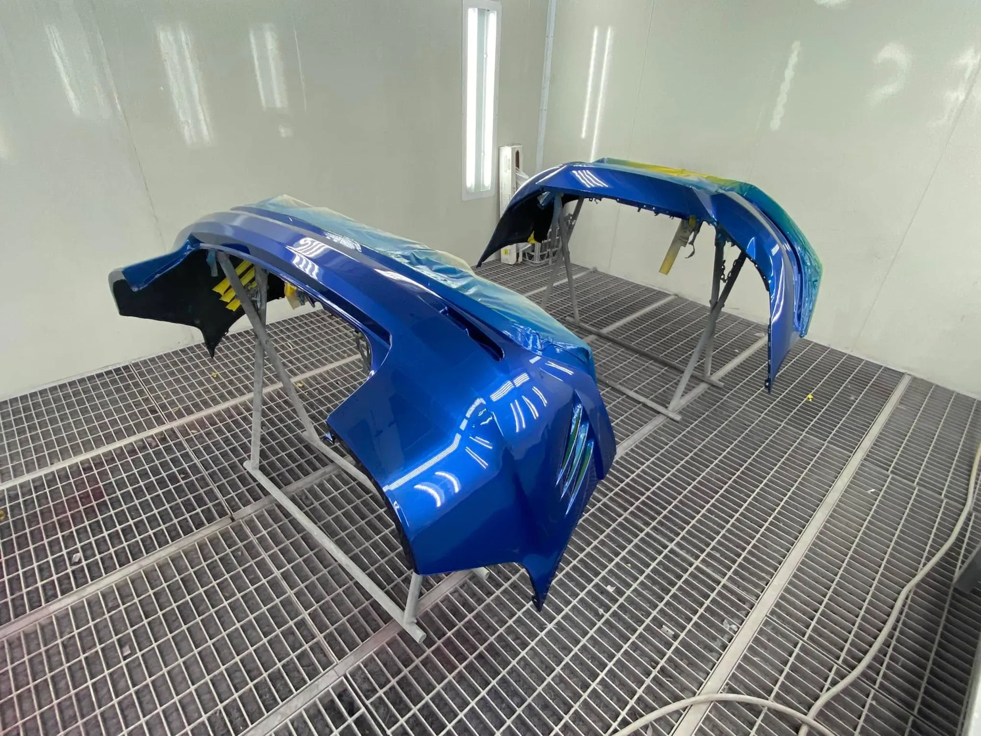 Blue front bumper bars freshly resprayed